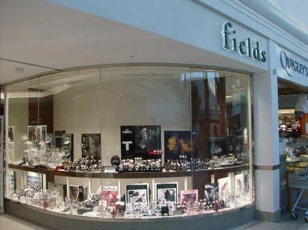 Curved frameless glass shopfront for Fields jewellers